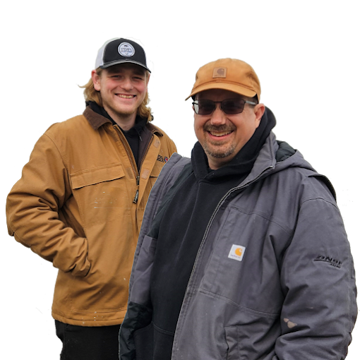 Shane and Joey Ward on a job site in work jackets