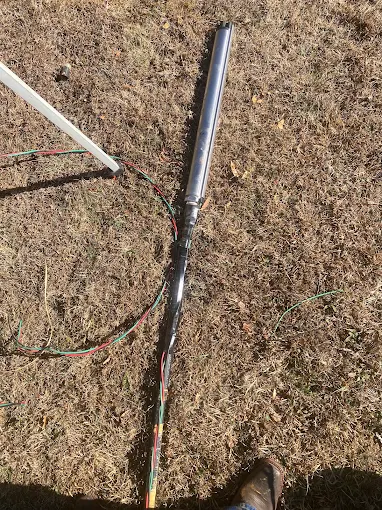 Submersible well pump with a fresh waterproof wire splice ready to install